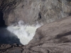  the crater inside constantly belches white sulphurous smoke