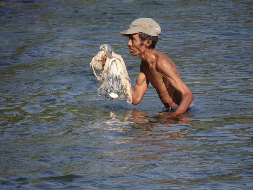 fishing man, Dili
